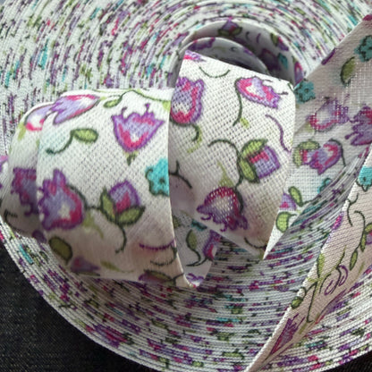 Purple floral cotton bias tape on the roll