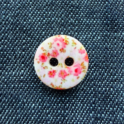 Whimsical patterned plastic shirt buttons in six prints on denim