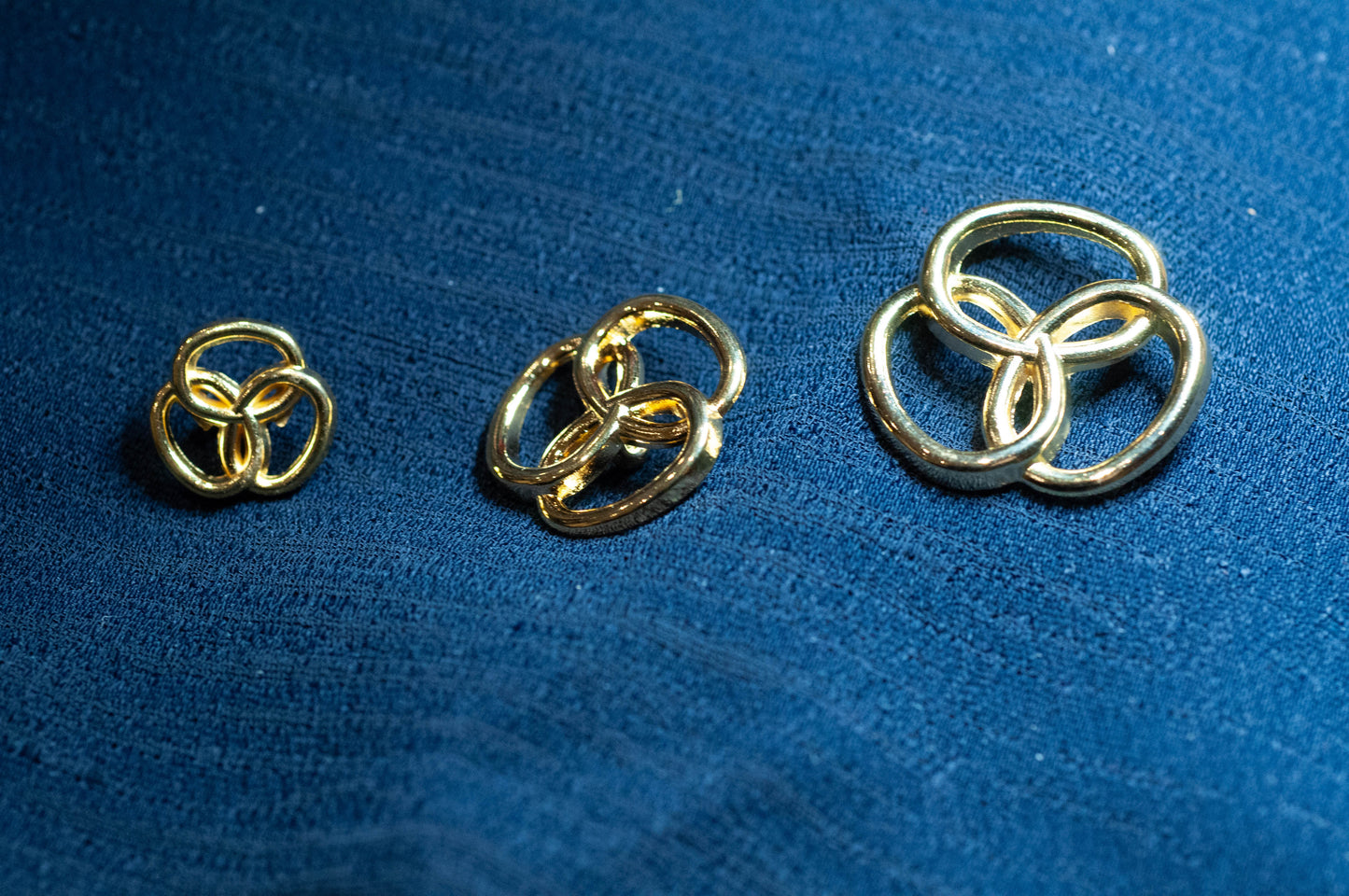 Gold Interlock Button